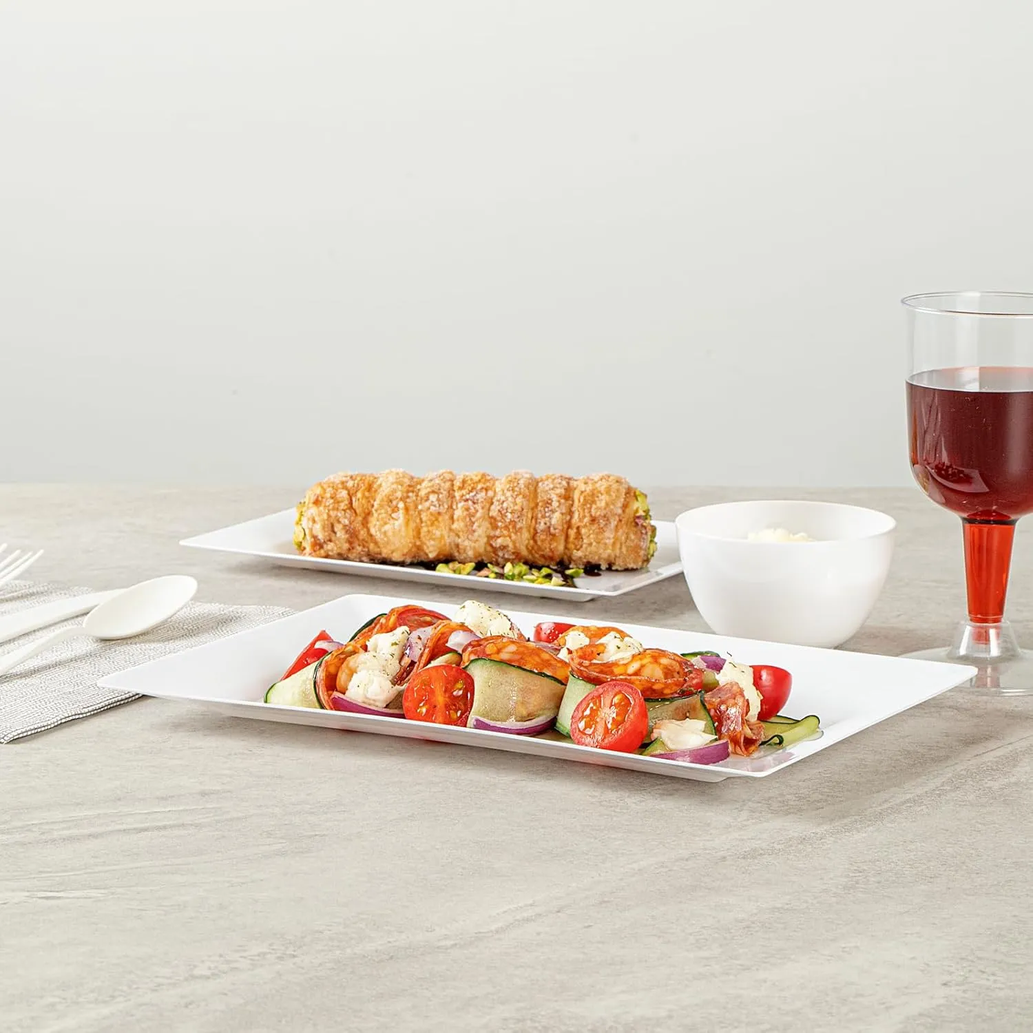 Restaurantware Moderna 9.5 x 6.3 Inch Premium Disposable Plates 100 Rectangular Plastic Plates For Parties - Durable Heavy-duty White Plastic Dinner Plates For Warm And Cold Foods