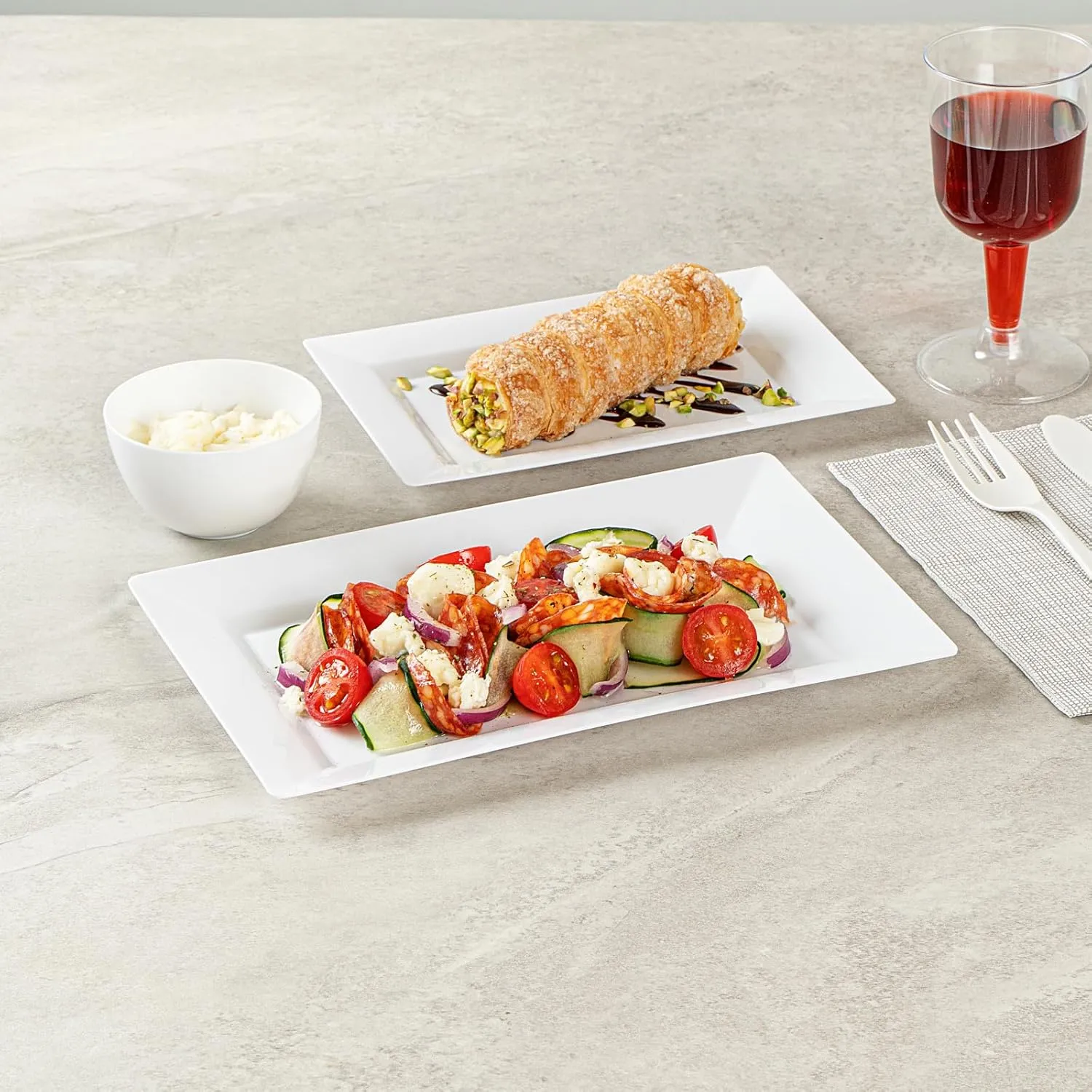 Restaurantware Moderna 9.5 x 6.3 Inch Premium Disposable Plates 100 Rectangular Plastic Plates For Parties - Durable Heavy-duty White Plastic Dinner Plates For Warm And Cold Foods